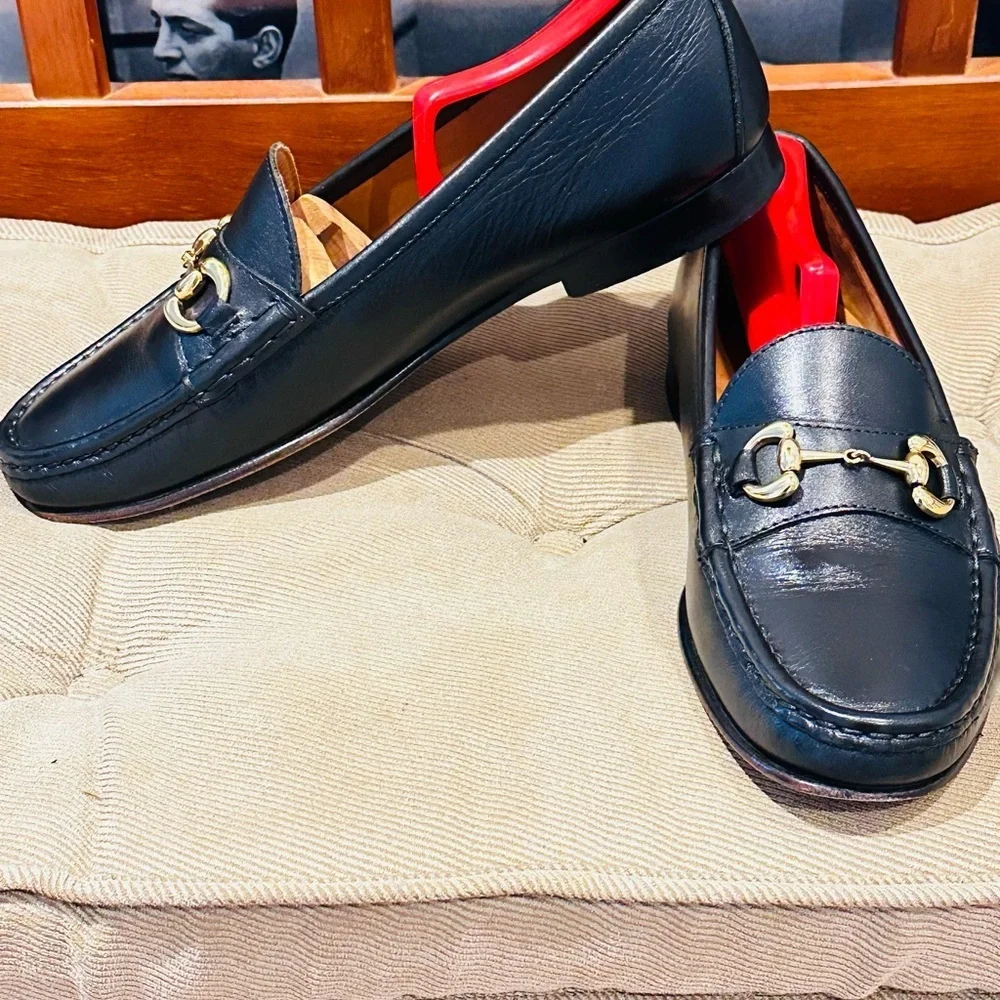 Jay Butler’s Horse Bit Black Leather Loafers with Gold Buckle.